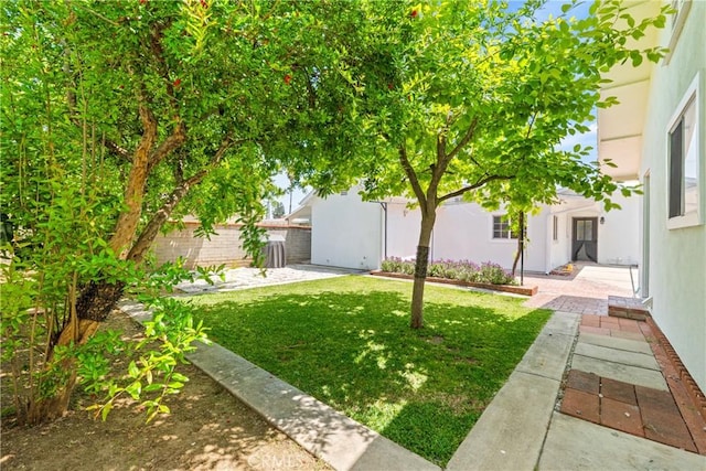 view of yard with a patio area and fence