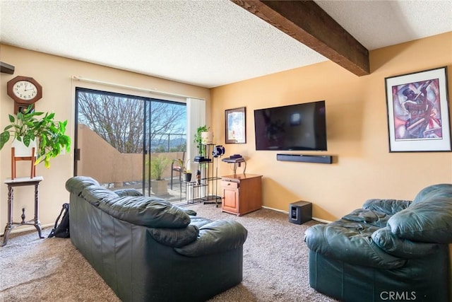 carpeted living room featuring baseboards, a textured ceiling, and beamed ceiling