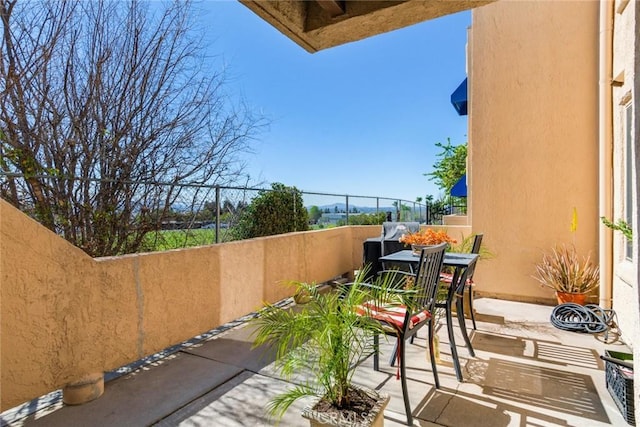 view of patio featuring outdoor dining area