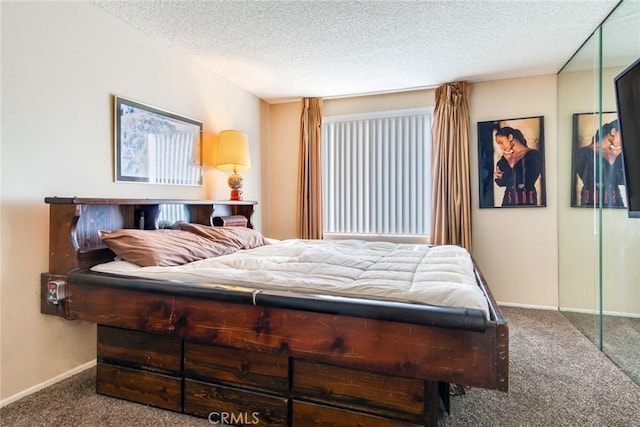 bedroom featuring a textured ceiling, baseboards, and carpet flooring