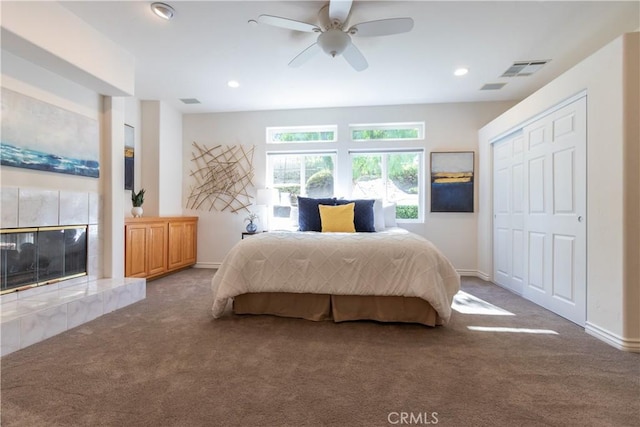 carpeted bedroom with baseboards, visible vents, ceiling fan, and recessed lighting