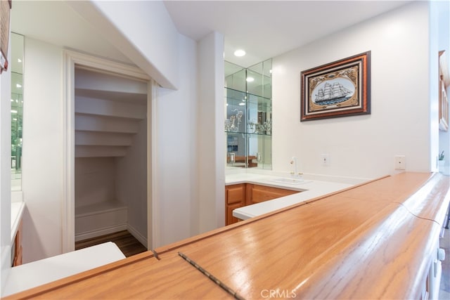 bar with recessed lighting and a sink