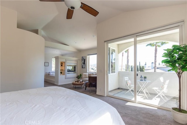 carpeted bedroom with ceiling fan, access to outside, and vaulted ceiling