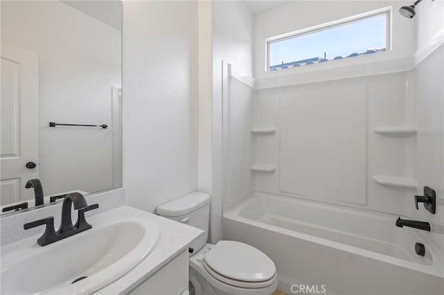 bathroom with shower / tub combination, vanity, and toilet