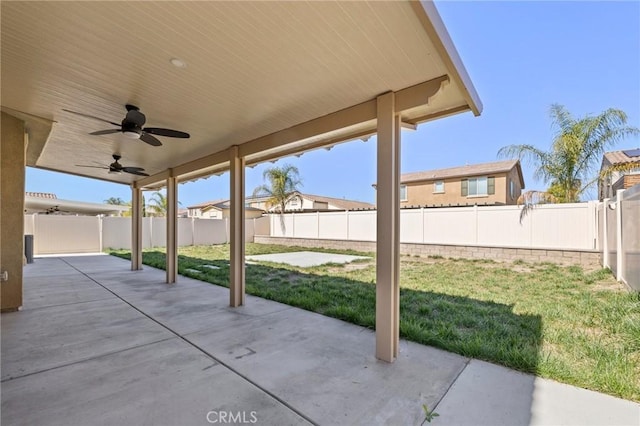 view of patio / terrace with a fenced backyard and ceiling fan