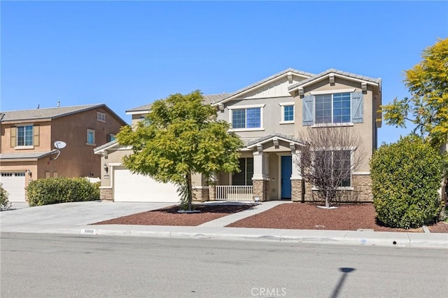 craftsman inspired home with stone siding, a tile roof, driveway, and stucco siding