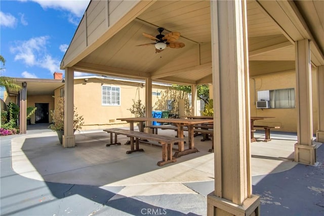 view of patio with ceiling fan and outdoor dining space