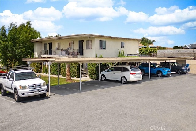 covered parking lot with stairway