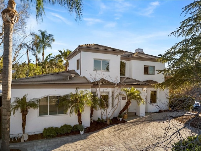 17846 Palora St, Encino, CA 91316 - back of property featuring stucco siding and a tile roof