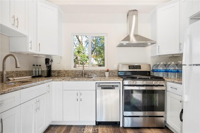 17846 Palora St, Encino, CA 91316 - kitchen with a sink, stainless steel appliances, white cabinets, and wall chimney range hood