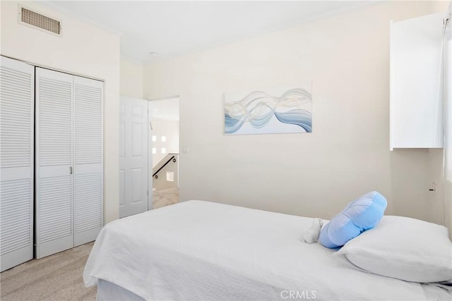 17846 Palora St, Encino, CA 91316 - bedroom with visible vents, light colored carpet, and a closet
