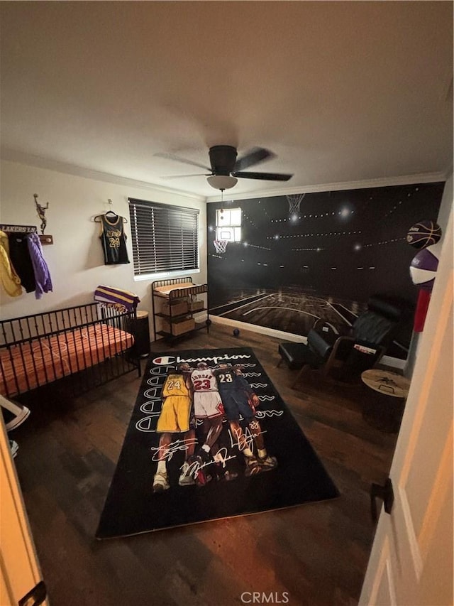 bedroom with ceiling fan, ornamental molding, and wood finished floors