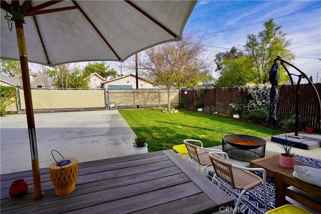 view of patio with a fenced backyard, a gate, and outdoor lounge area