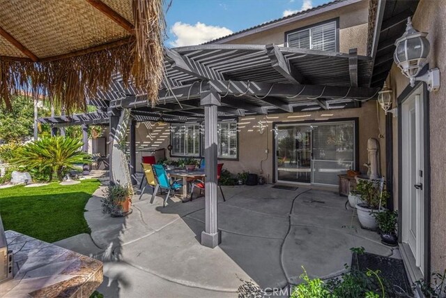 view of patio featuring a pergola