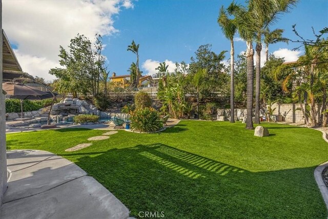 view of yard with fence