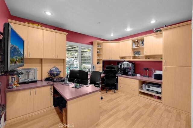 office space with recessed lighting and light wood-style flooring