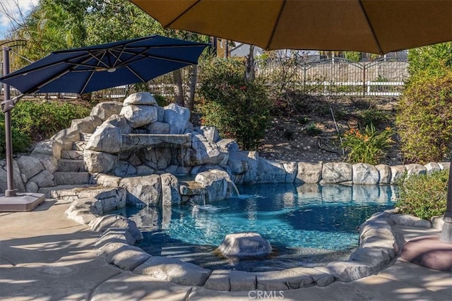 pool featuring fence