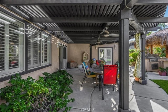 view of patio / terrace featuring an outdoor kitchen, french doors, and grilling area