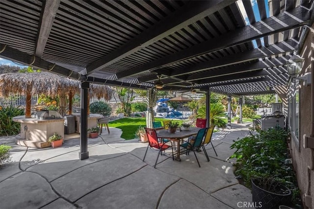 view of patio featuring outdoor dining space and a pergola