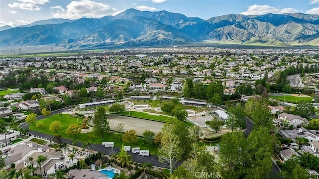 aerial view with a mountain view and a residential view