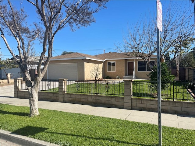 ranch-style home featuring a garage, concrete driveway, stucco siding, a fenced front yard, and a front yard