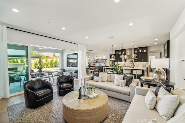 living room featuring wood finished floors and recessed lighting