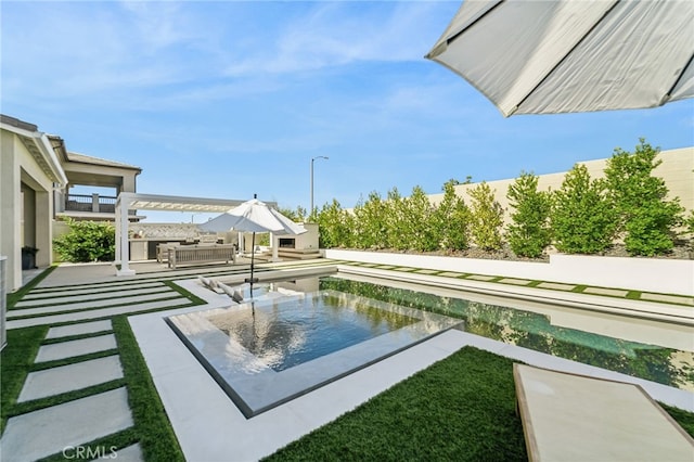 view of pool featuring a patio area