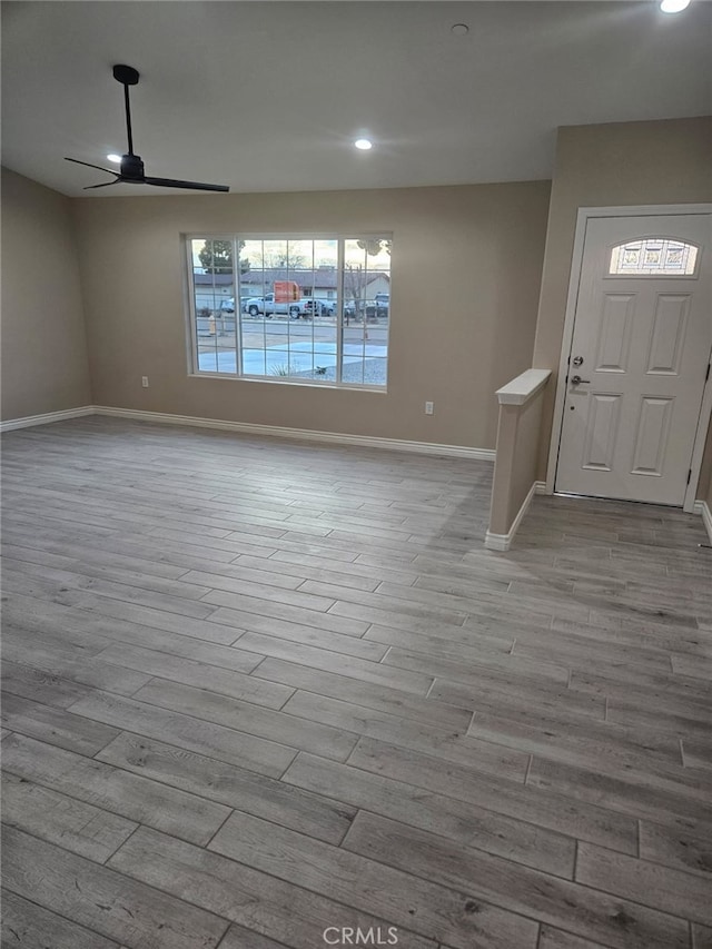 entrance foyer featuring recessed lighting, ceiling fan, baseboards, and wood finished floors