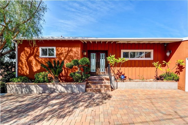 view of front of home featuring french doors