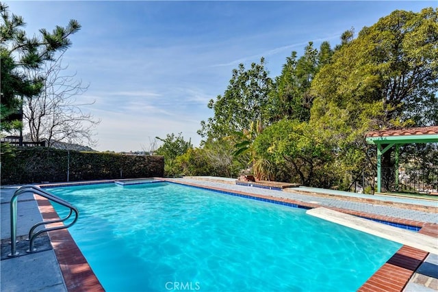 view of pool featuring a fenced in pool