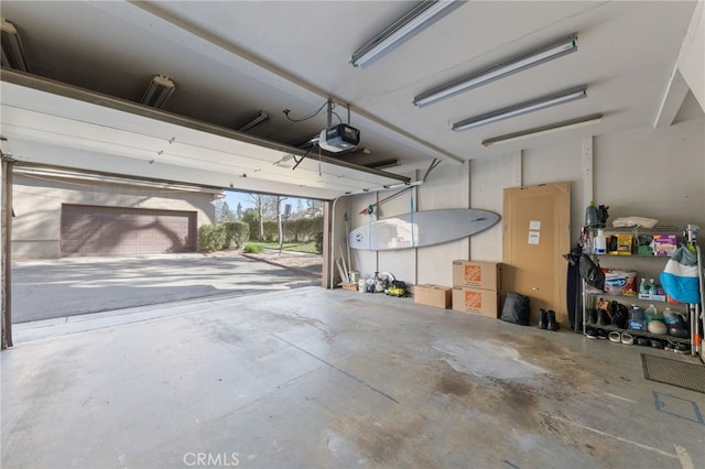 garage featuring a garage door opener