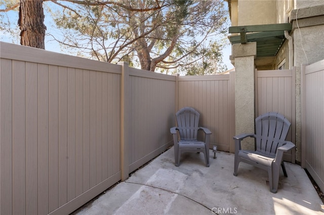 view of patio with a fenced backyard