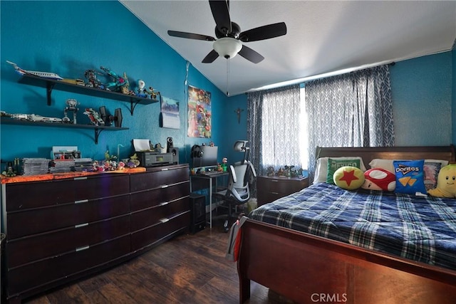 bedroom featuring lofted ceiling, ceiling fan, and dark wood-style flooring