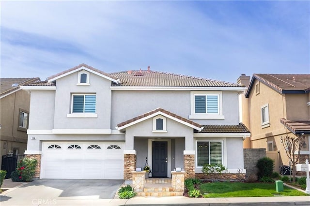 view of front of house featuring concrete driveway, fence, and stucco siding