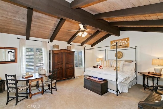 carpeted bedroom featuring lofted ceiling with beams and wooden ceiling