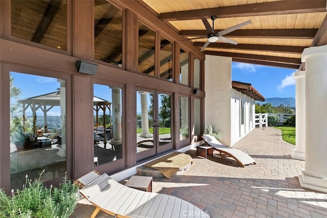 view of patio with french doors and a mountain view