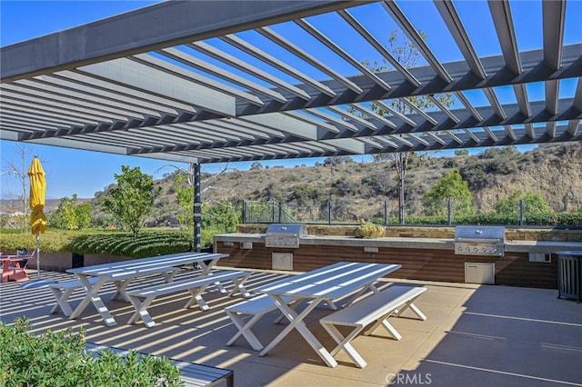 view of patio / terrace featuring outdoor dining area, area for grilling, and a pergola