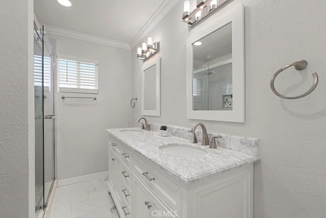 bathroom featuring a shower stall, marble finish floor, a sink, and crown molding