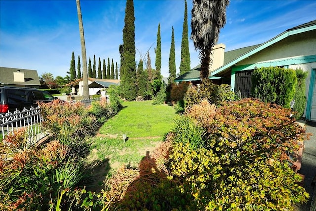 view of yard with fence