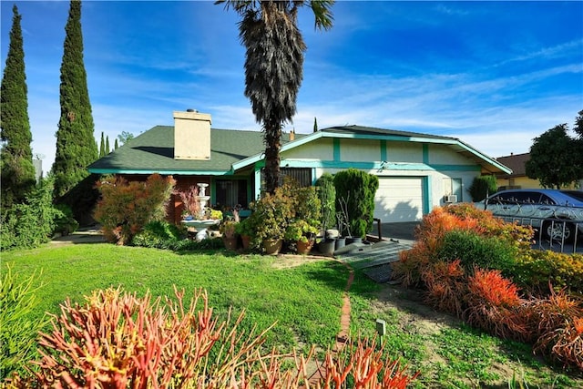 view of front of home featuring a garage and a chimney