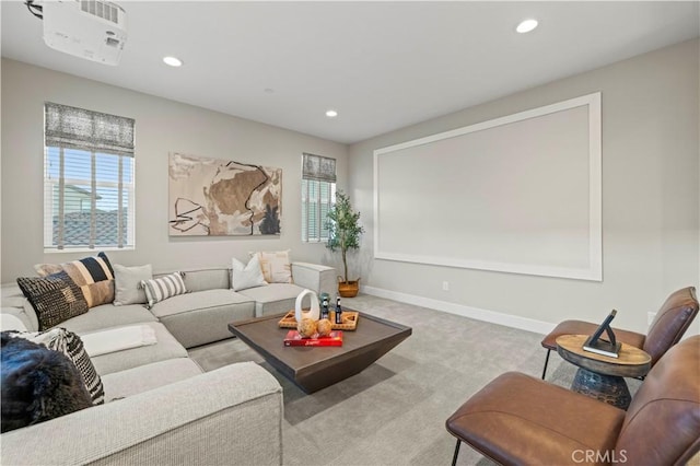 living area featuring carpet floors, recessed lighting, and baseboards