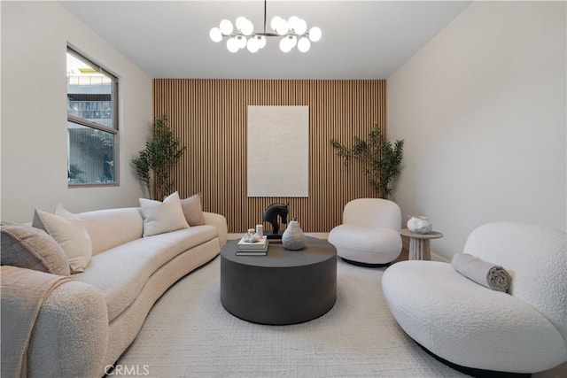 living area featuring an inviting chandelier