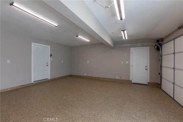 garage with baseboards