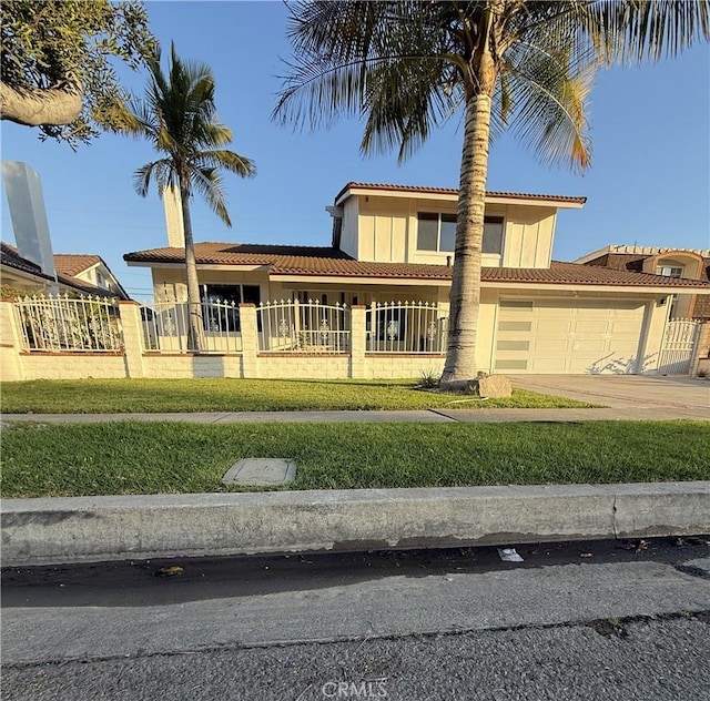 view of front of house featuring a garage, concrete driveway, a fenced front yard, a tiled roof, and stucco siding