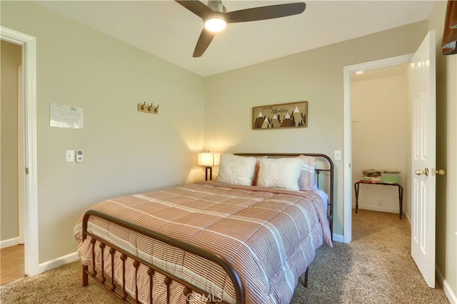 bedroom featuring carpet flooring, ceiling fan, and baseboards