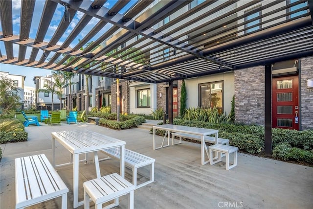 view of patio / terrace featuring outdoor dining space and a pergola