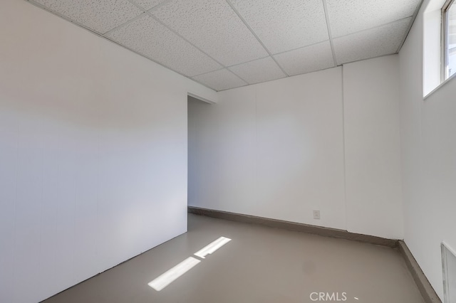 empty room with a drop ceiling