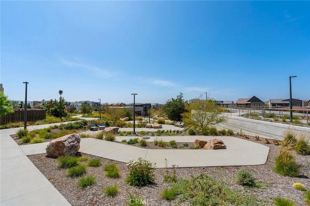 view of property's community with fence