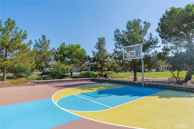 view of sport court featuring basketball hoop