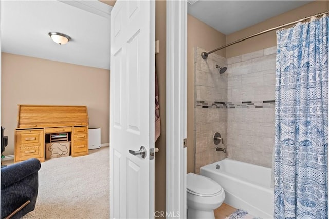 full bath featuring shower / tub combo and toilet